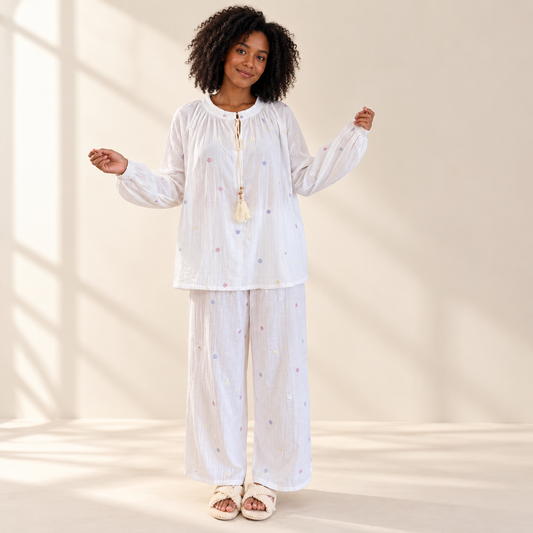 Skinlay white embroidered long-sleeve lounge top on an adult model; trousers shown for styling only